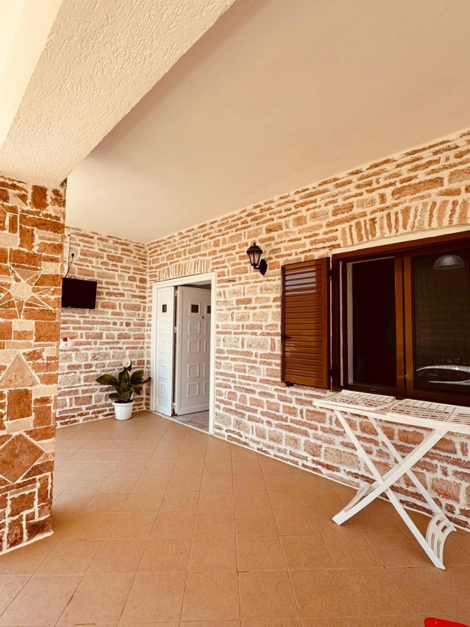Orfeu Apartments Ksamil Esterno foto